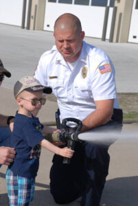 ARFF Ops Supervisor Chris Deitz with little guest