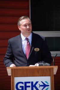 Executive Director Ryan Riesinger at Ribbon Cutting Event